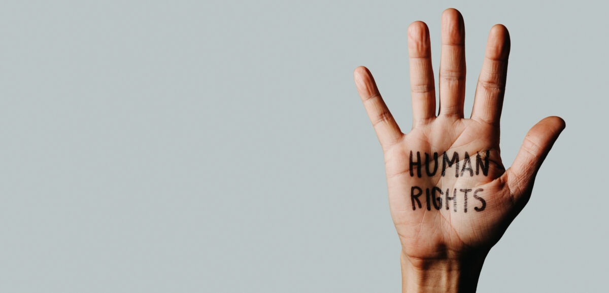 text-human-rights-in-the-palm-web-banner